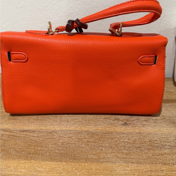 Elegant Orange Crossbody Bag with Pink Blue Horse Charm Accent - Picture 2 of 4